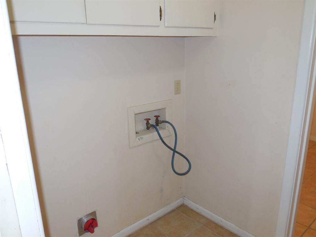 820 Walnut Street Ranger, TX 76470 - Photo 16 of 21 a bathroom with a shower