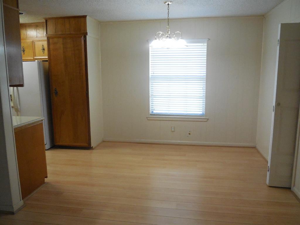 820 Walnut Street Ranger, TX 76470 - Photo 10 of 21 a view of an empty room with a window