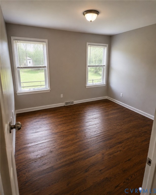 6316 Derwent Road Richmond, VA 23225 - Photo 9 of 10 Room featuring rich wood-finish flooring, neutral
