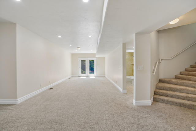 220 East Ridge Road Orem, UT 84057 - Photo 33 of 52 Expansive carpeted area with recessed lighting, white trim, and a double glass-paned door