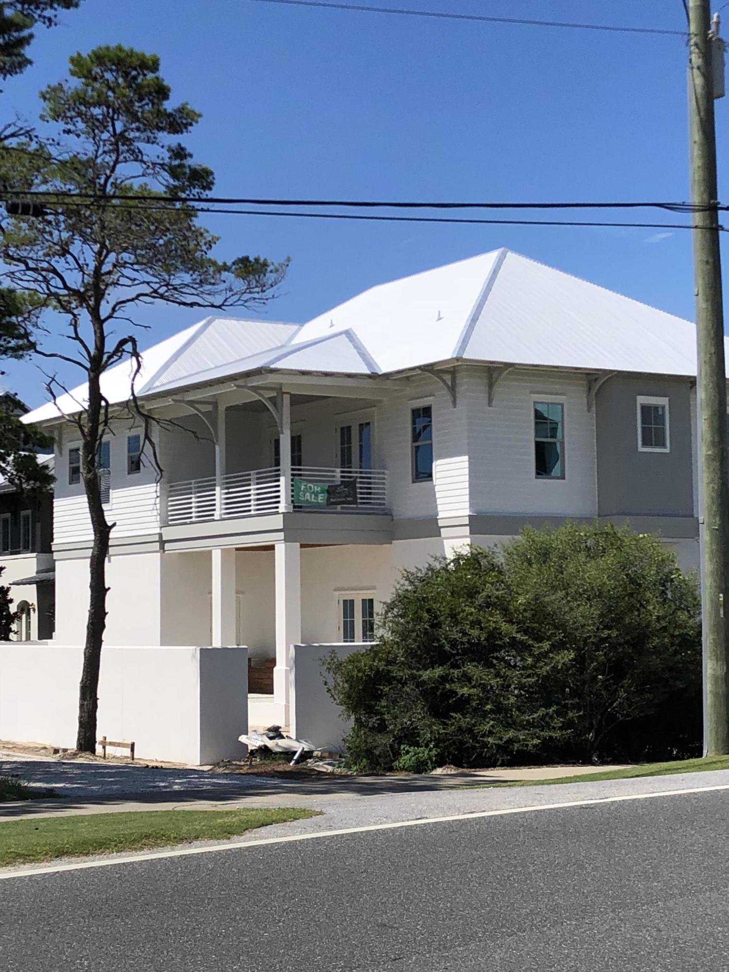 94 Pine Crest Circle Rosemary Beach, FL 32461 - Photo 22 of 24 a front view of house with a garden