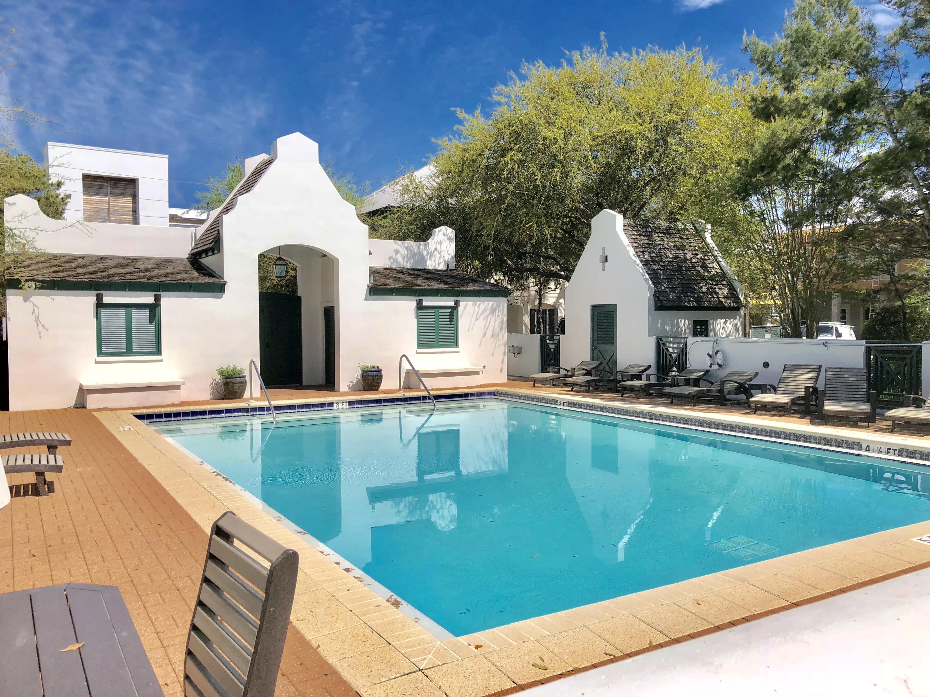 94 Pine Crest Circle Rosemary Beach, FL 32461 - Photo 5 of 24 a view of a house with pool and chairs