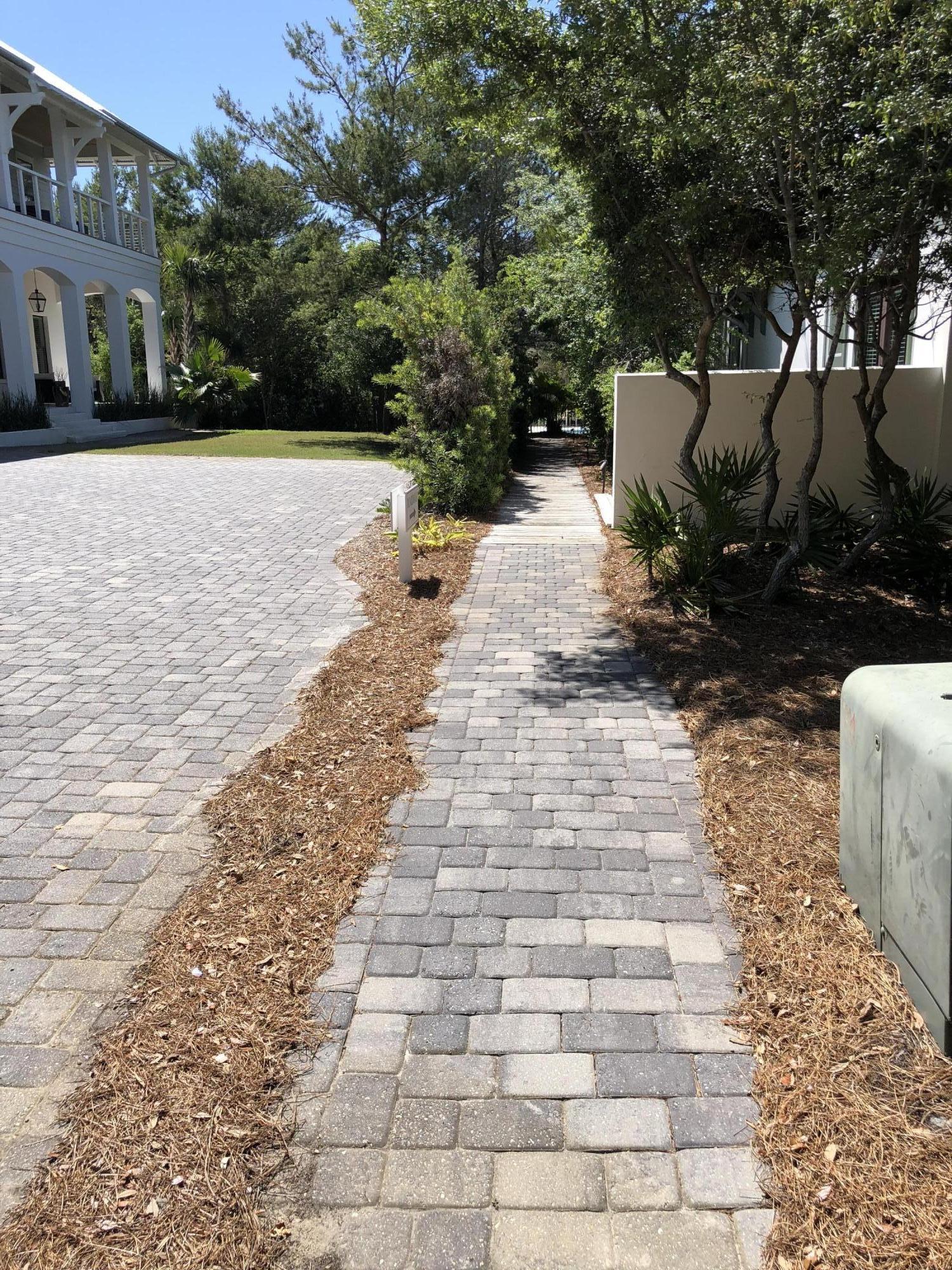 94 Pine Crest Circle Rosemary Beach, FL 32461 - Photo 8 of 24 a view of a backyard with sitting area