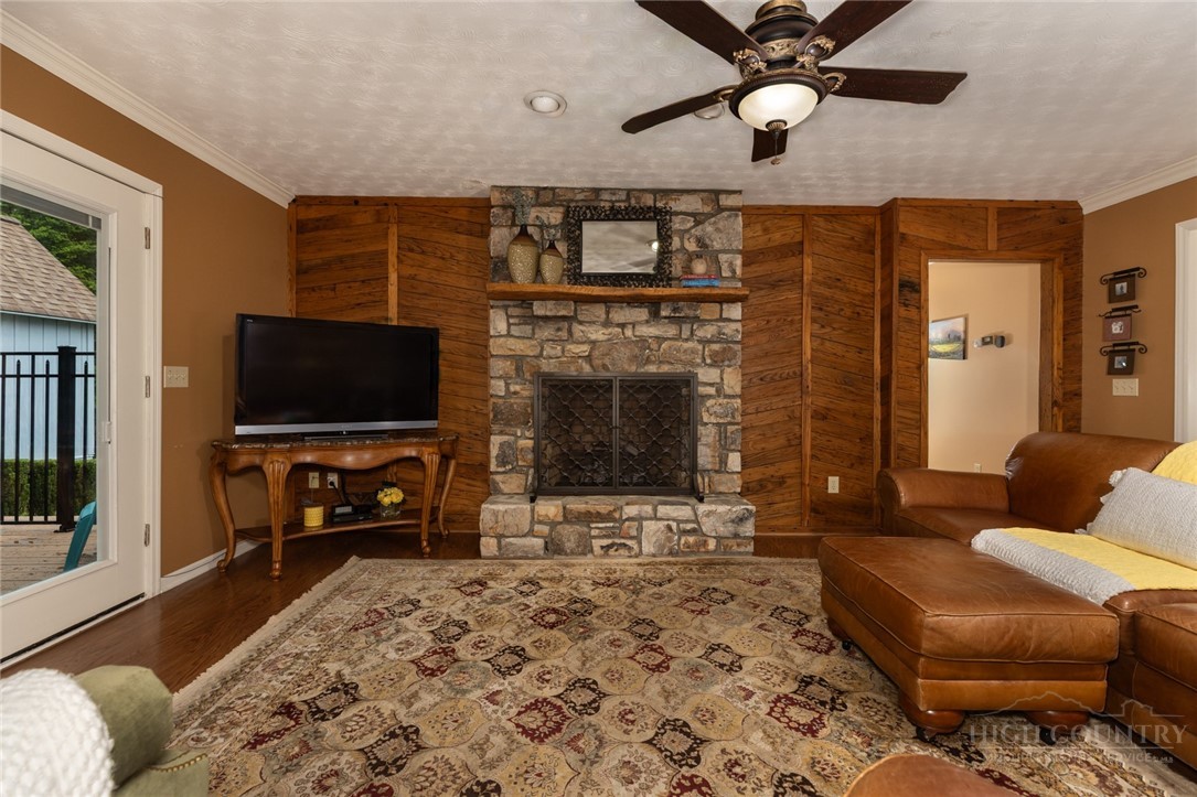 1335 Shingle Gap Road Purlear, NC 28665 - Photo 20 of 49 a living room with furniture and a flat screen tv
