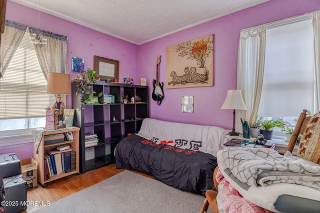 a view of a big room with windows