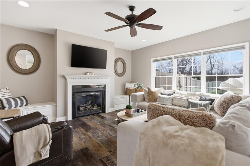 2094 Laurel Ridge Drive Clairton, PA 15025 - Photo 4 of 27 a living room with furniture a fireplace and a flat screen tv
