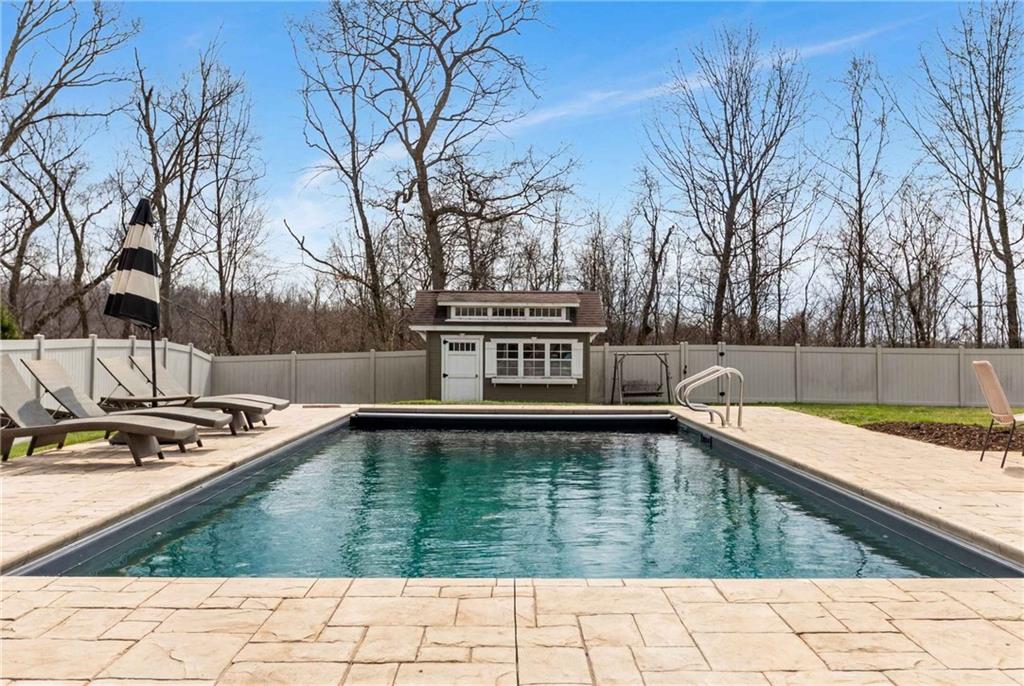 2094 Laurel Ridge Drive Clairton, PA 15025 - Photo 7 of 27 a view of a swimming pool with a yard