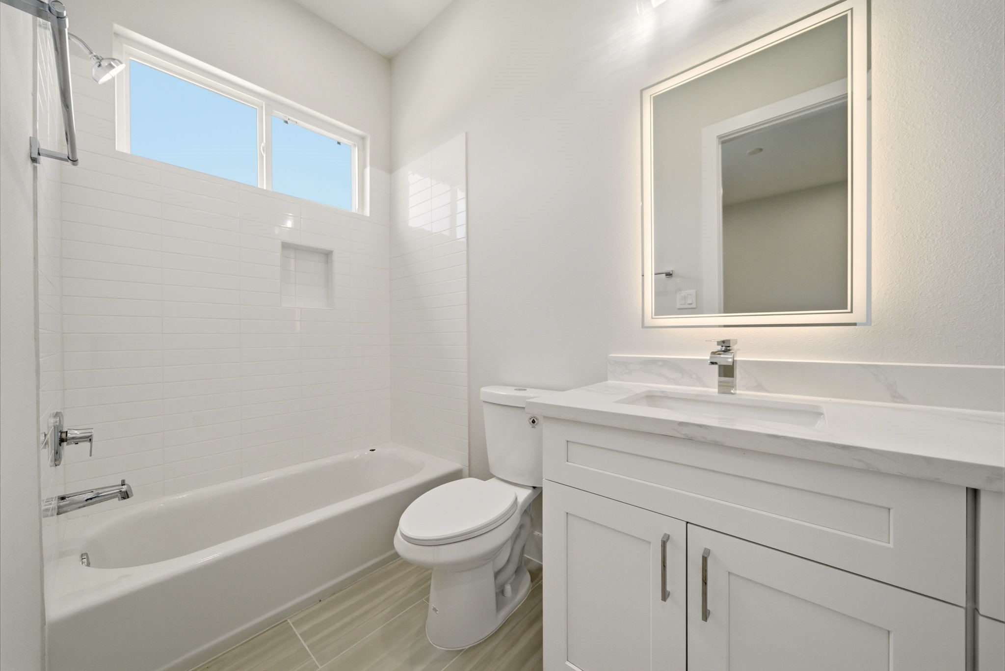 1398 Cedar Post Lane Houston, TX 77080 - Photo 18 of 33 a bathroom with a granite countertop toilet a sink and a bathtub
