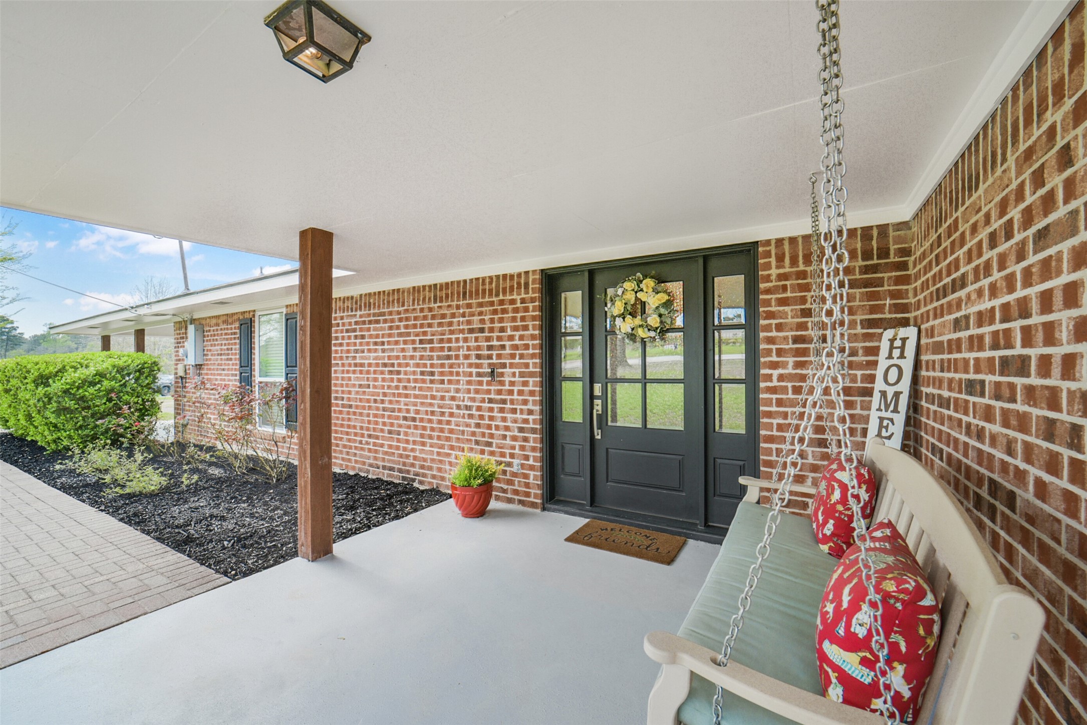 10313 South Williams Road Conroe, TX 77303 - Photo 4 of 48 Front porch with room for a porch swing