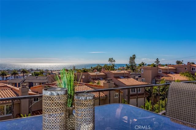 a view of a balcony with chairs