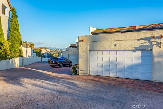 a view of parking area and car parked