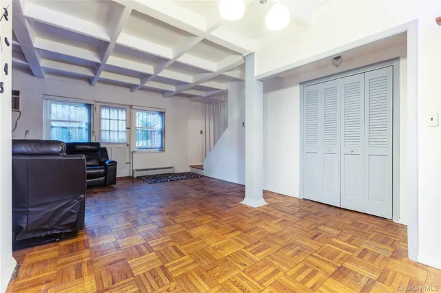 a view of a livingroom with a workspace