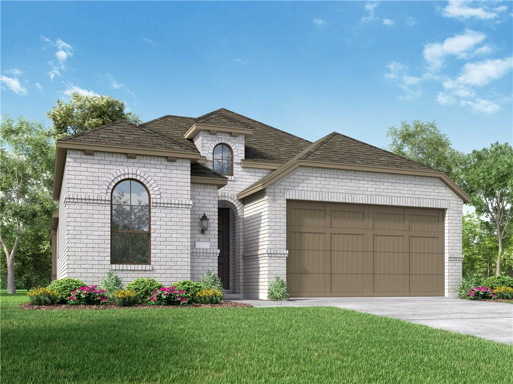 1105 Sendero Trail Georgetown, TX 78628 - Photo 1 of 1 a front view of a house with garden