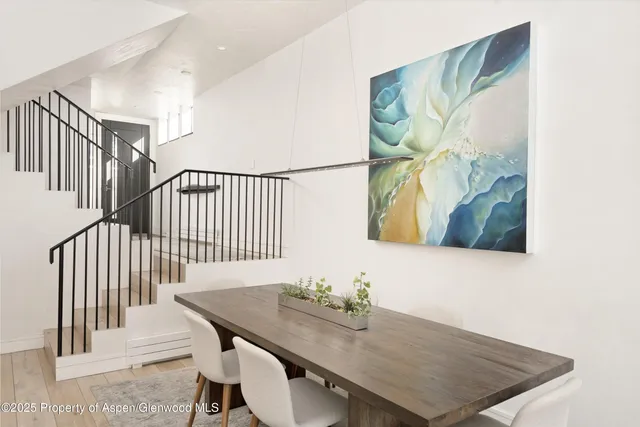 a view of a dining room with furniture