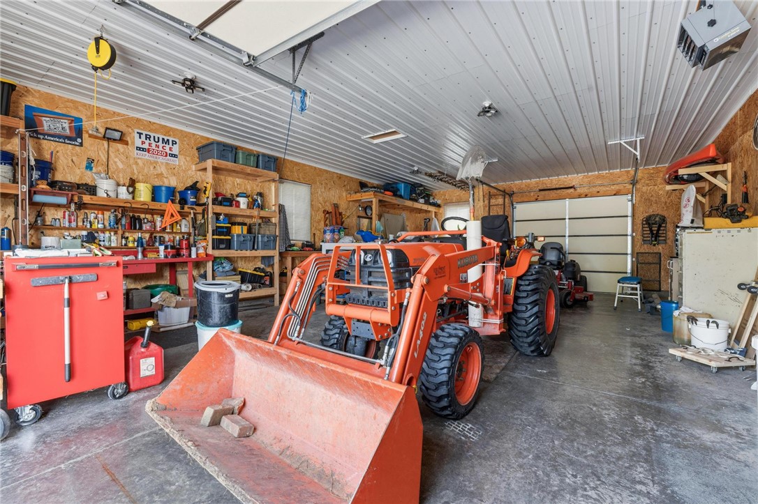 4971 Lackey Road Cedarville, OH 45314 - Photo 14 of 79 This spacious workshop offers ample room for projects and equipment, ensuring functionality and convenience.