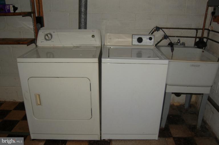 13205 Clifton Road Silver Spring, MD 20904 - Photo 17 of 30 washer dryer and deep sink