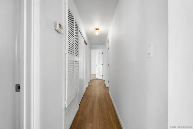 a view of a house with a yard and a garage