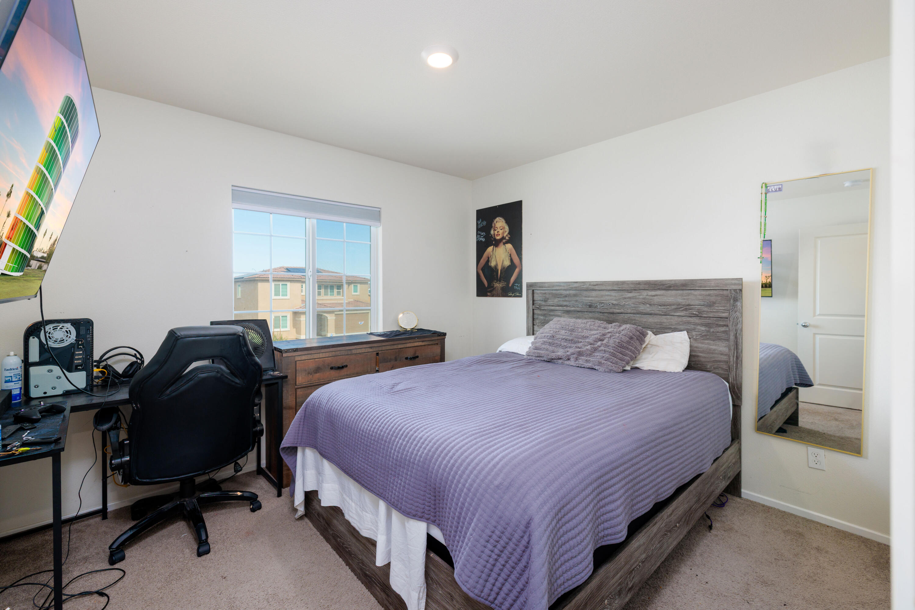 50187 Camino Rosario Coachella, CA 92236 - Photo 11 of 25 a bedroom with bed and a window