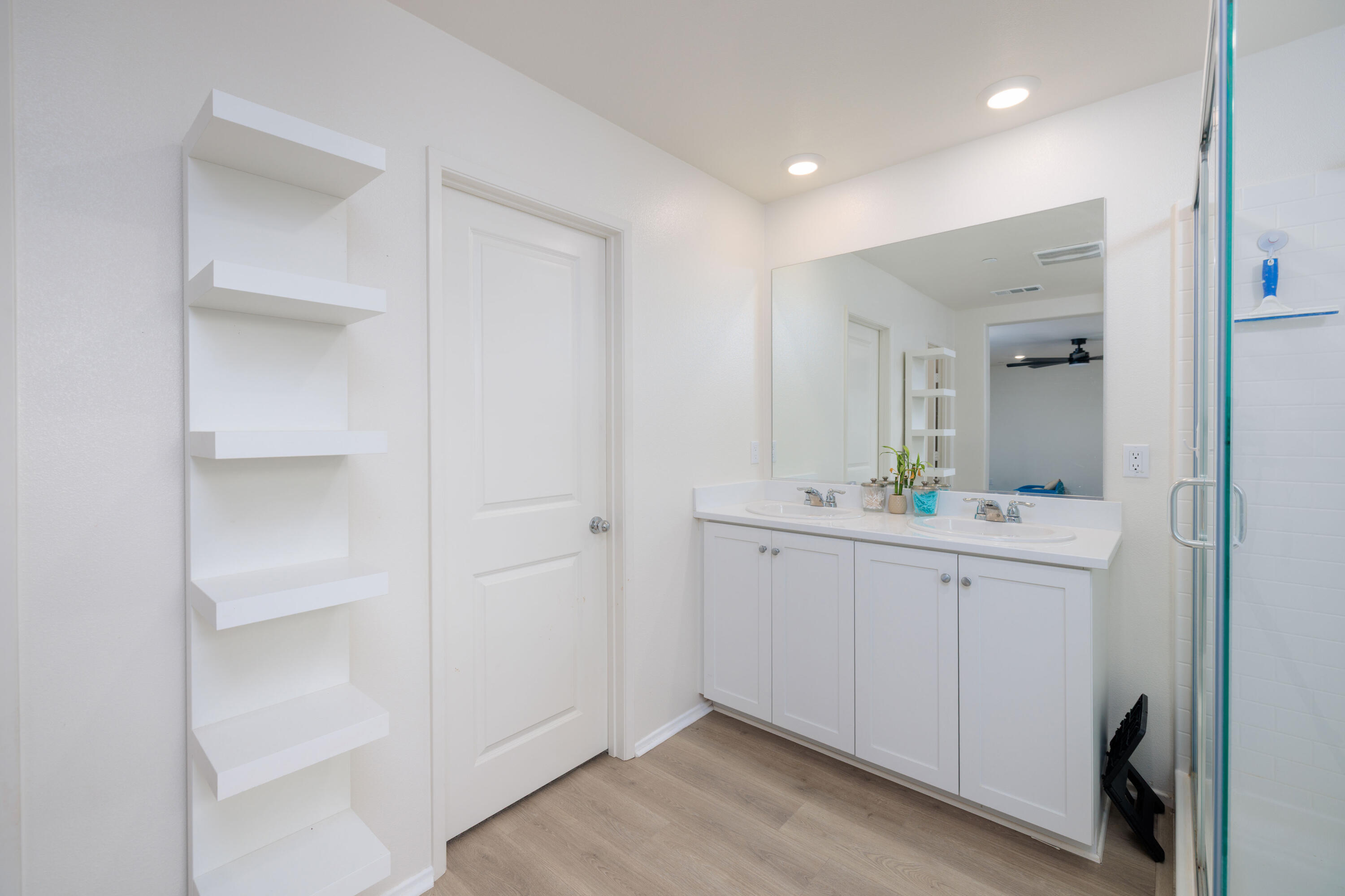 50187 Camino Rosario Coachella, CA 92236 - Photo 12 of 25 a bathroom with a sink and mirror