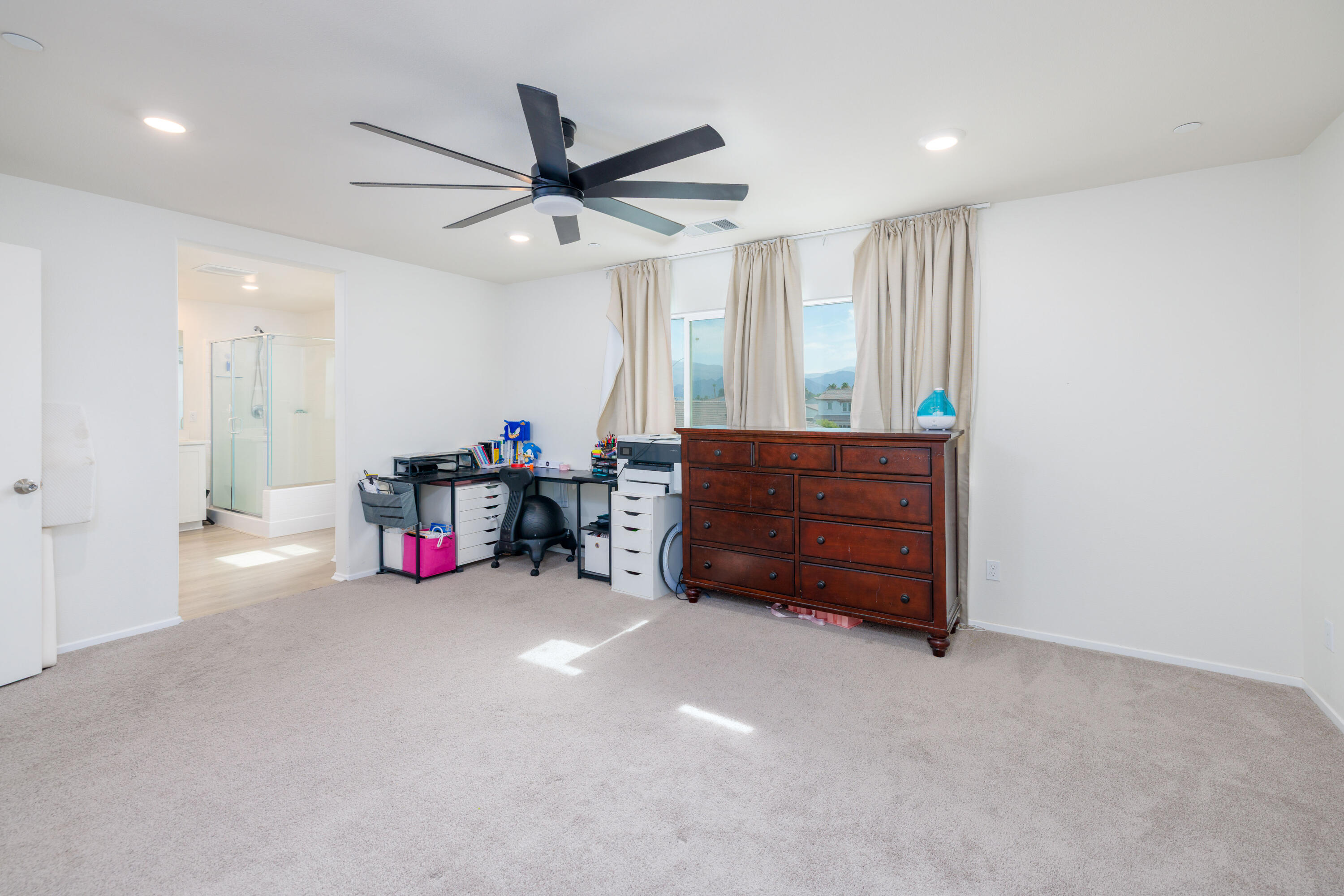 50187 Camino Rosario Coachella, CA 92236 - Photo 14 of 25 a living room with furniture and a ceiling fan