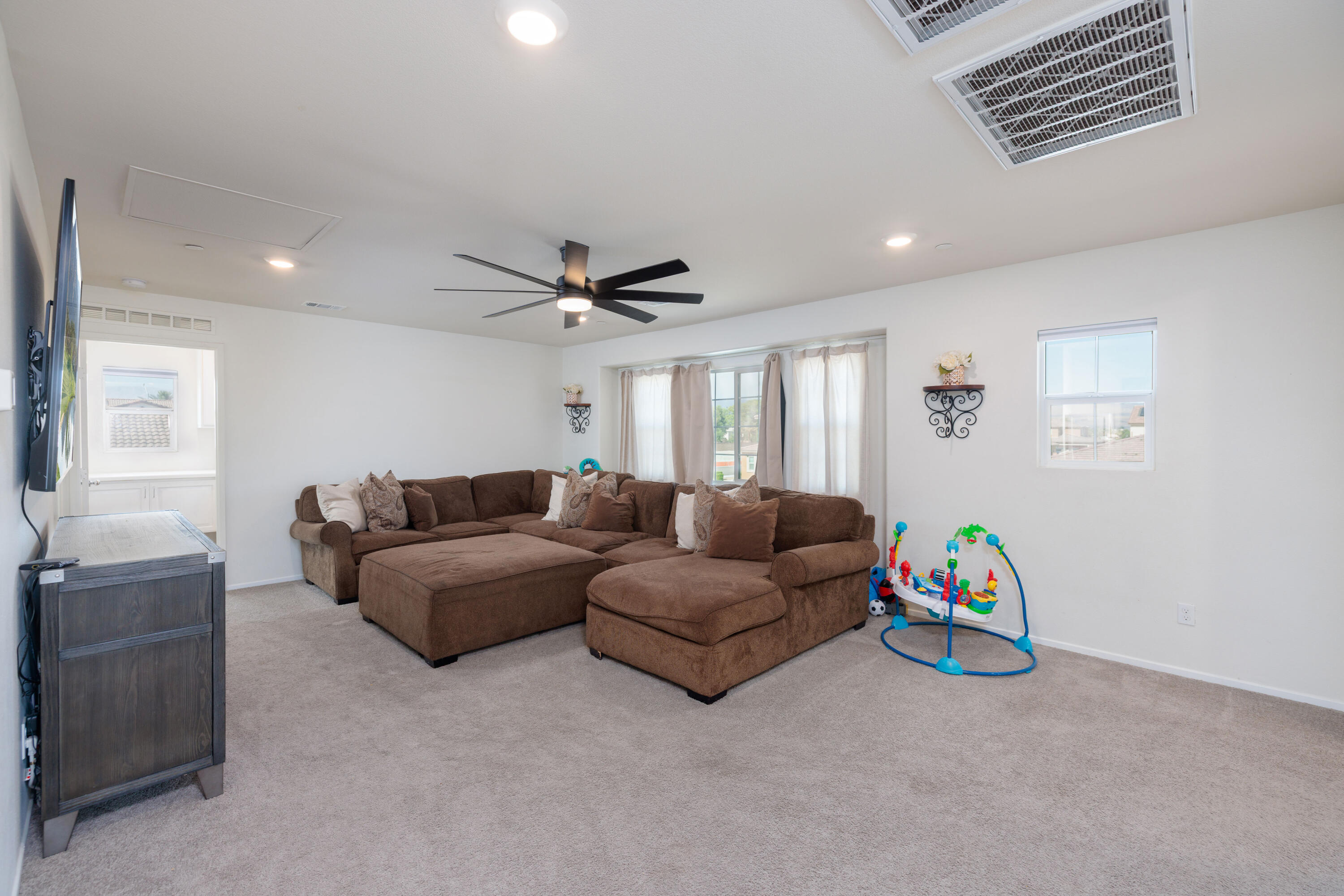 50187 Camino Rosario Coachella, CA 92236 - Photo 21 of 25 a living room with furniture and a window