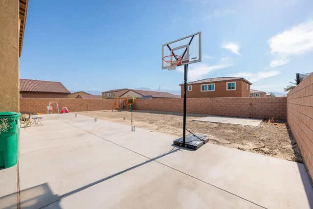 a view of a house with a street