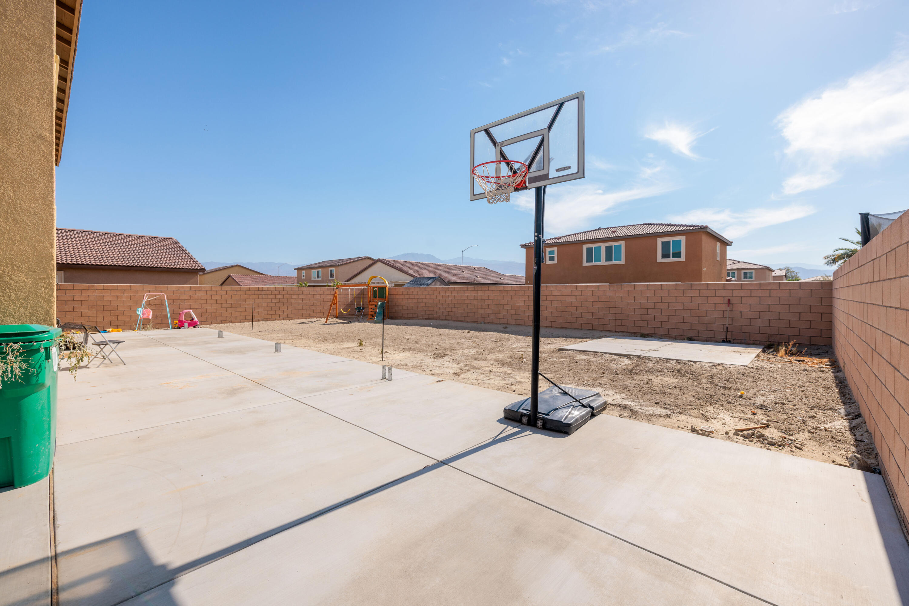 50187 Camino Rosario Coachella, CA 92236 - Photo 23 of 25 a front view of a house with parking