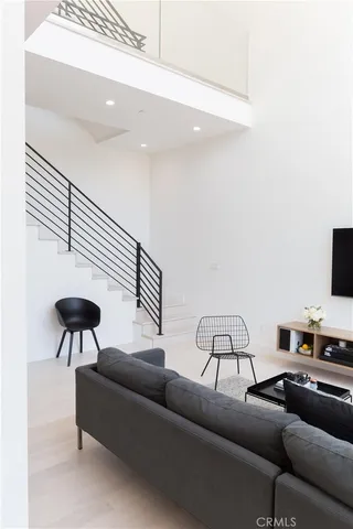a living room with furniture and a couch