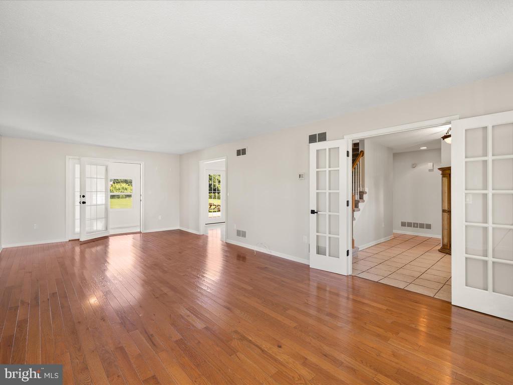 991 Church Hill Road Milford, DE 19963 - Photo 22 of 38 a view of empty room with wooden floor