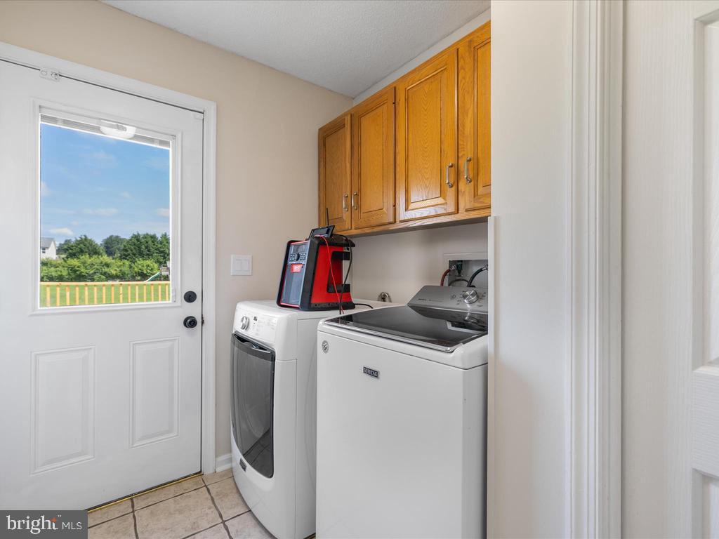 991 Church Hill Road Milford, DE 19963 - Photo 25 of 38 a view of storage and utility room with washer and dryer