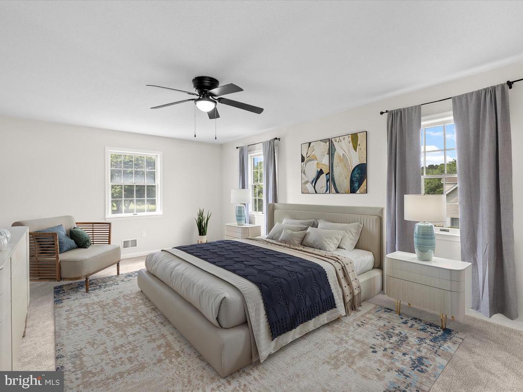 991 Church Hill Road Milford, DE 19963 - Photo 26 of 38 a bedroom with a bed couches and window