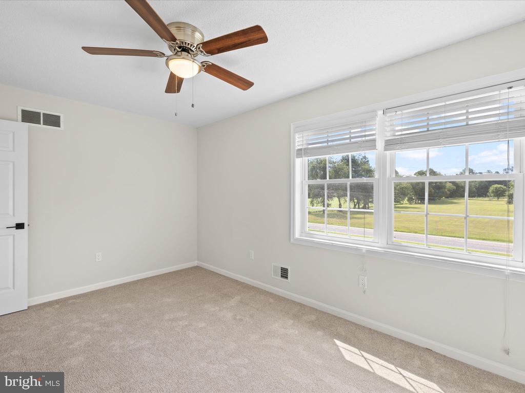 991 Church Hill Road Milford, DE 19963 - Photo 32 of 38 an empty room with a window