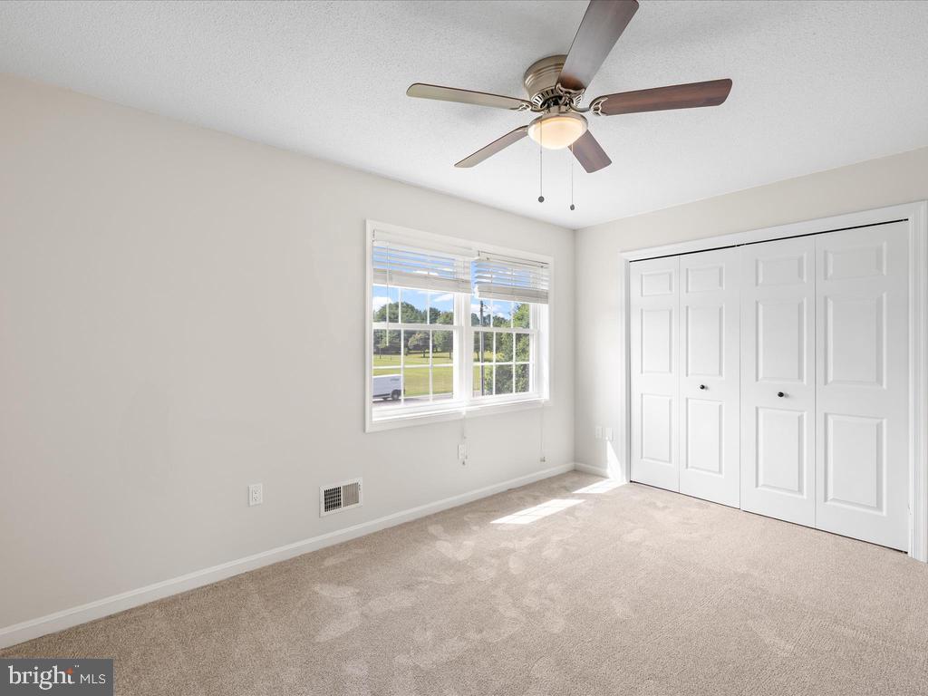 991 Church Hill Road Milford, DE 19963 - Photo 33 of 38 a view of an empty room with a window