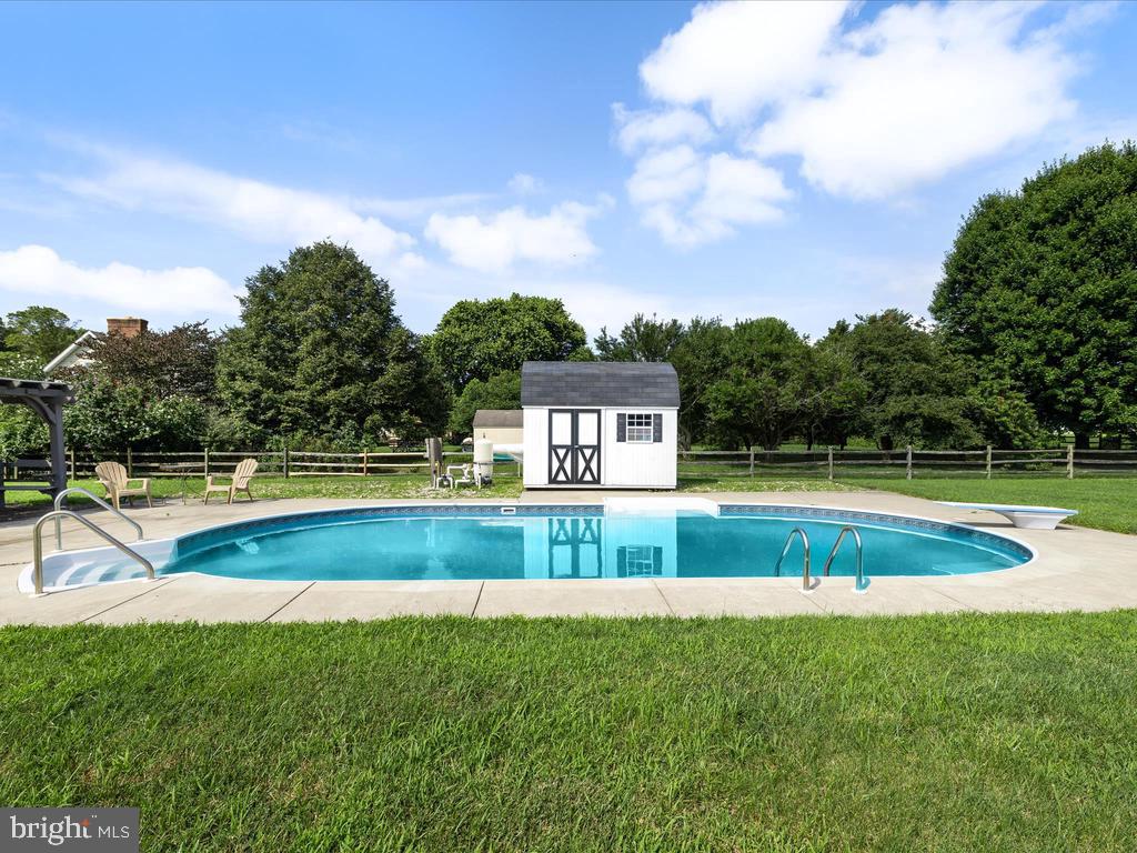991 Church Hill Road Milford, DE 19963 - Photo 5 of 38 a view of swimming pool with a yard