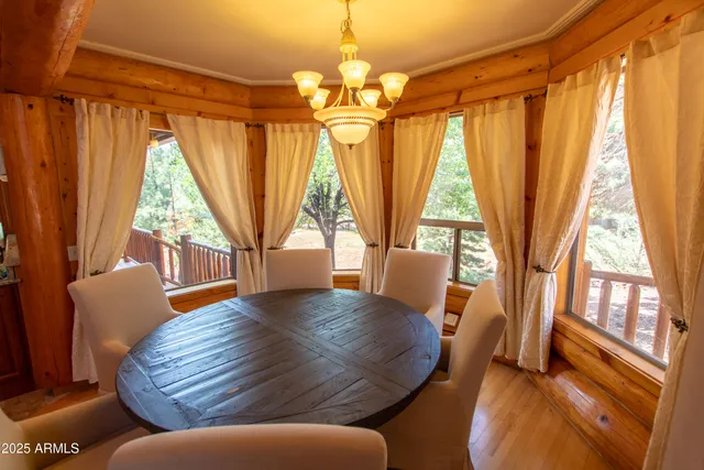 a kitchen with stainless steel appliances granite countertop a refrigerator a stove and a refrigerator