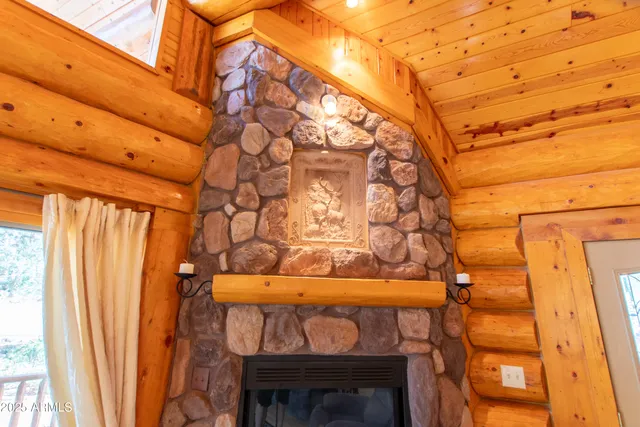 an aerial view of a house with a yard and garden