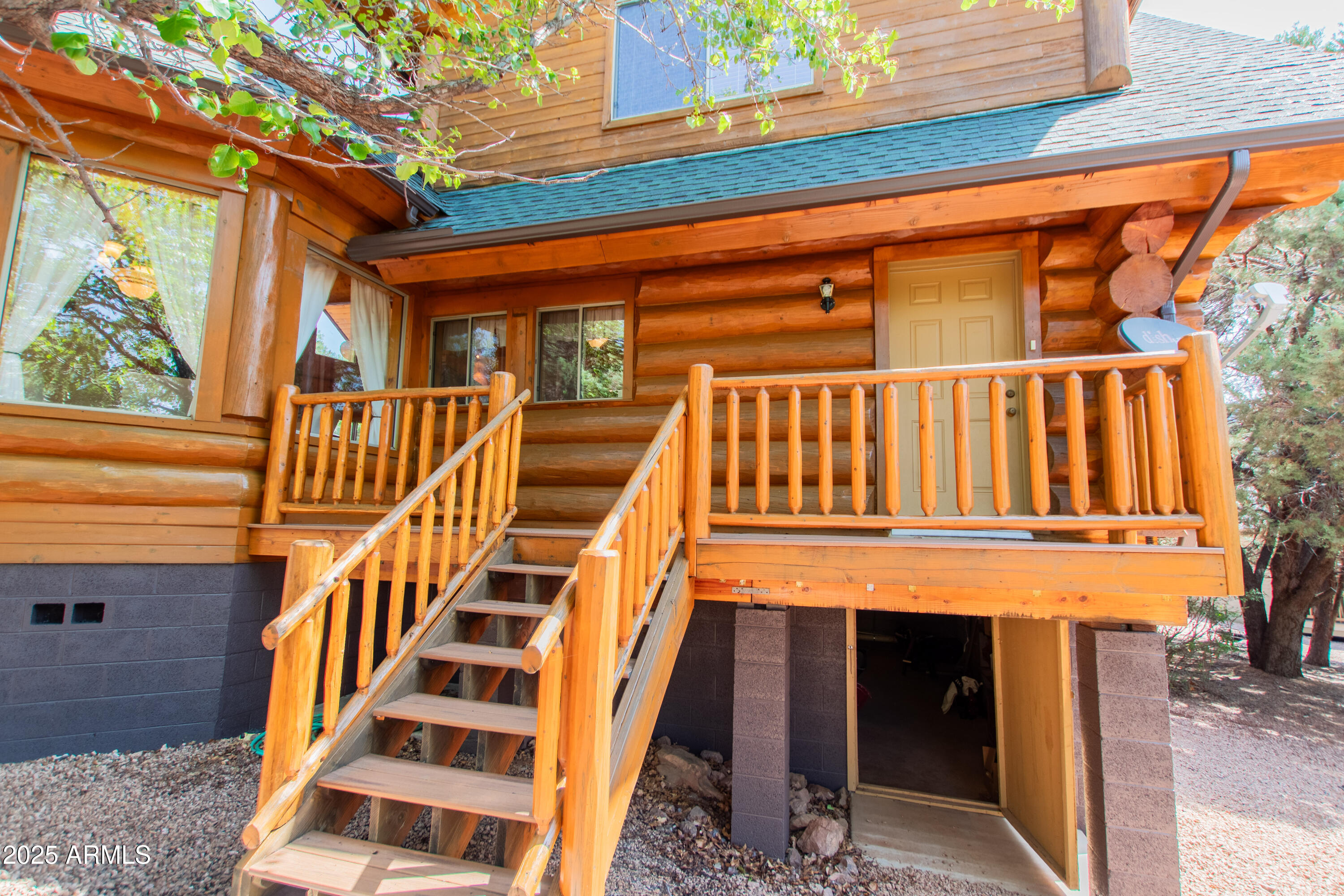 6168 Hidden Pines Loop Pine, AZ 85544 - Photo 54 of 77 a view of entryway with a front door