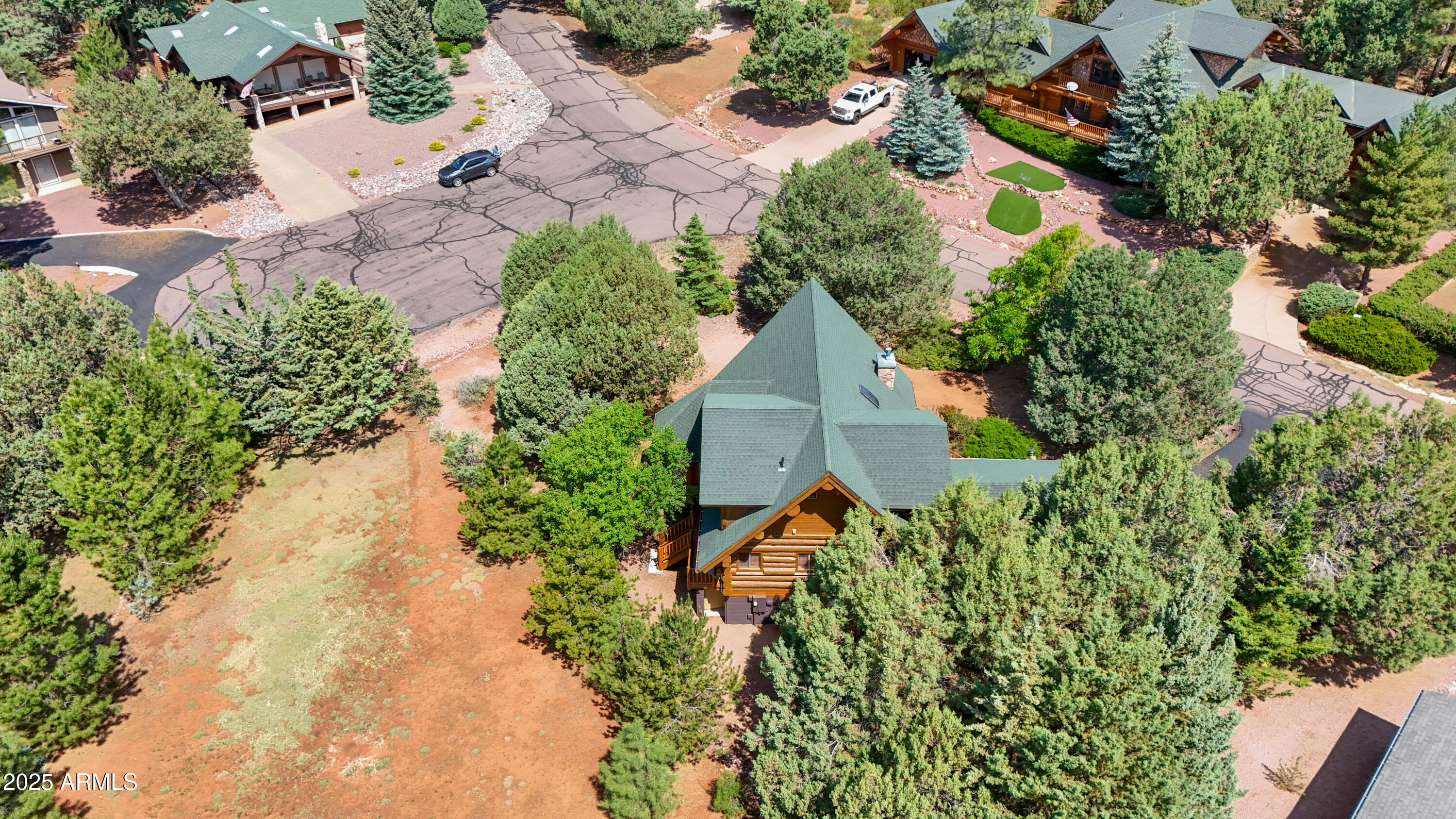 6168 Hidden Pines Loop Pine, AZ 85544 - Photo 65 of 77 an aerial view of residential house with outdoor space and trees all around