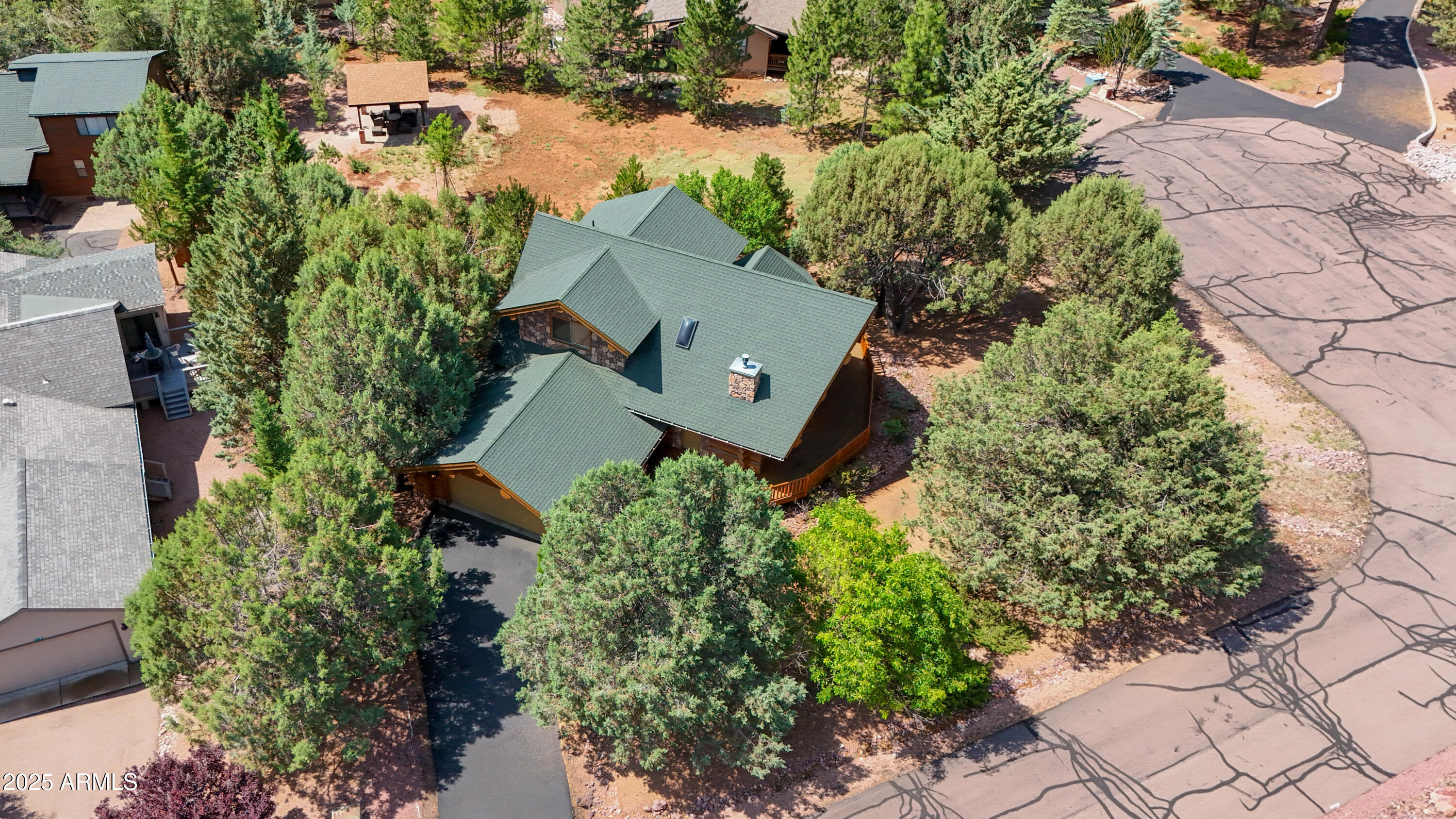 6168 Hidden Pines Loop Pine, AZ 85544 - Photo 69 of 77 an aerial view of a house with yard and outdoor seating