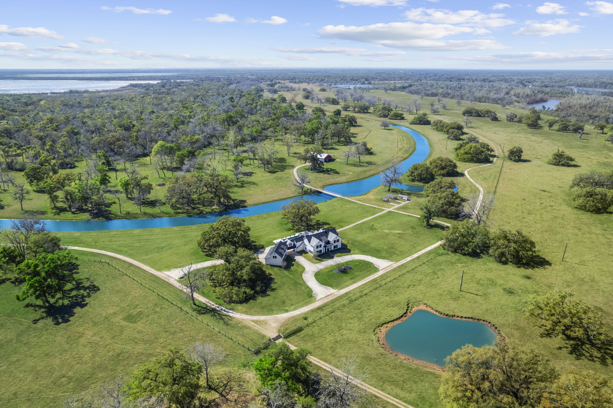 an aerial view of a house with a garden