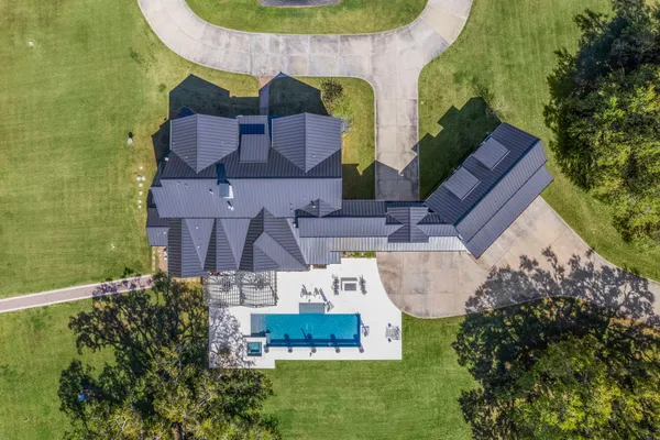 a backyard of a house with lots of green space