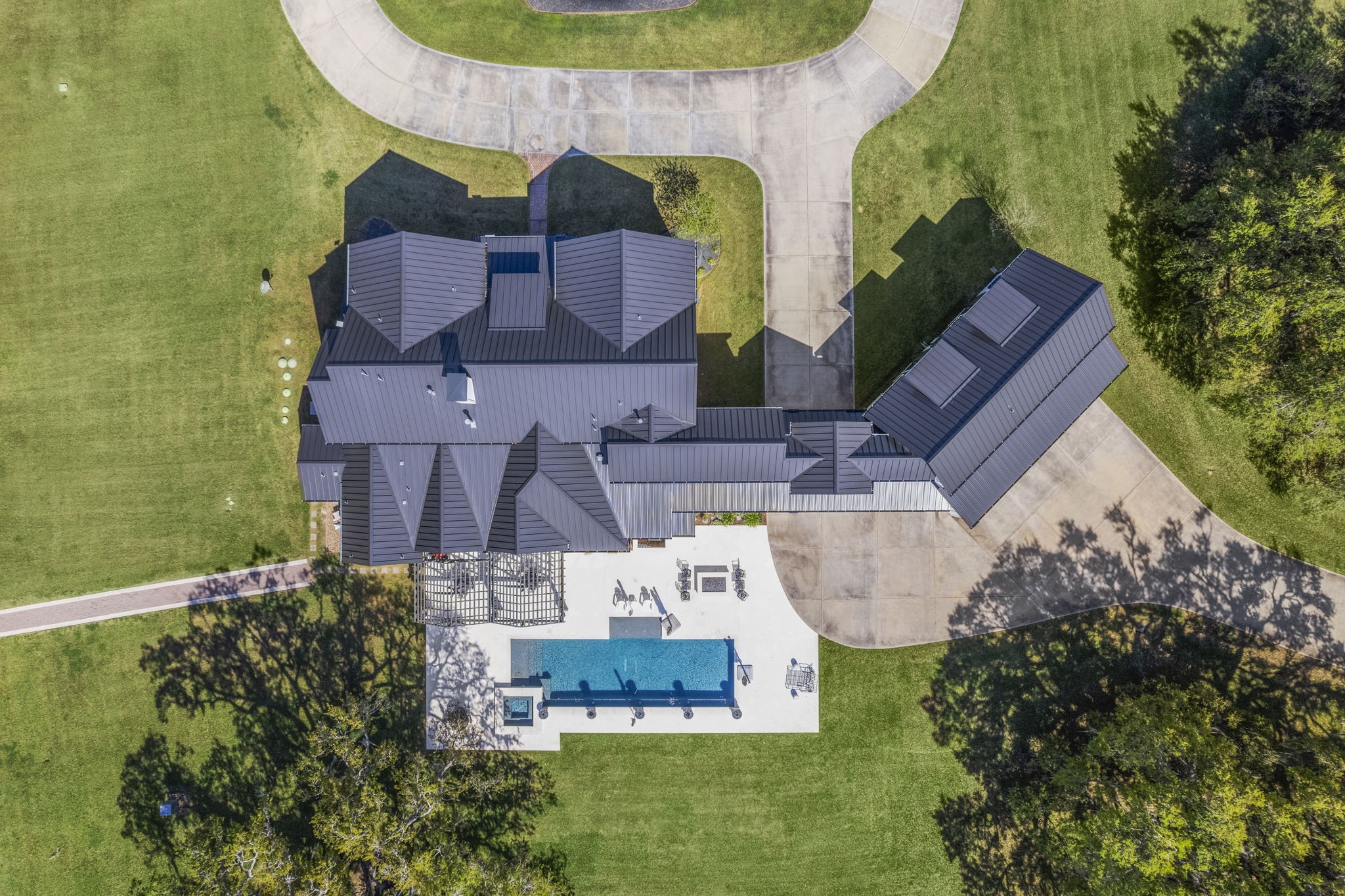 7341 County Road 27 Damon, TX 77430 - Photo 49 of 50 an aerial view of residential house with outdoor space and swimming pool