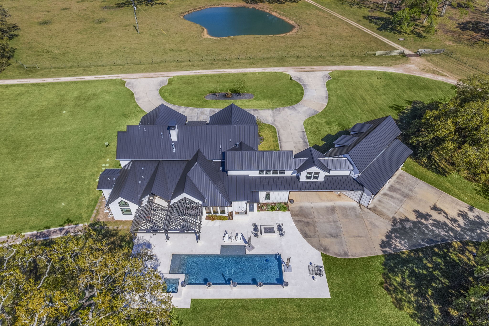 7341 County Road 27 Damon, TX 77430 - Photo 5 of 50 an aerial view of residential house with outdoor space and swimming pool