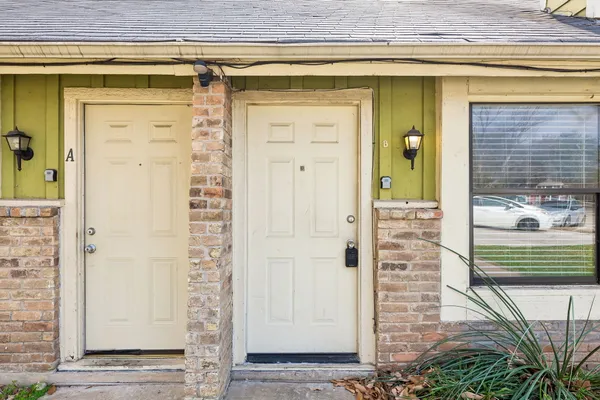 a view of a entryway door front of house