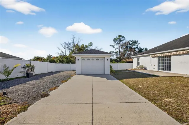 a view of living room and kitchen