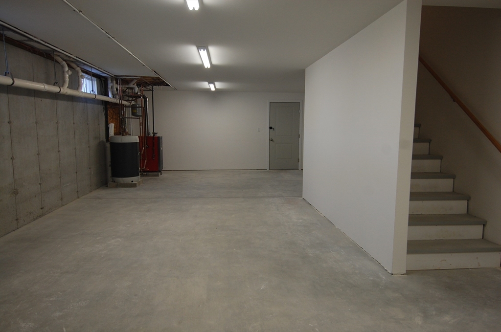 9 Bolton Road, Unit N Dartmouth, MA 02748 - Photo 19 of 19 wooden floor and stairs in a room