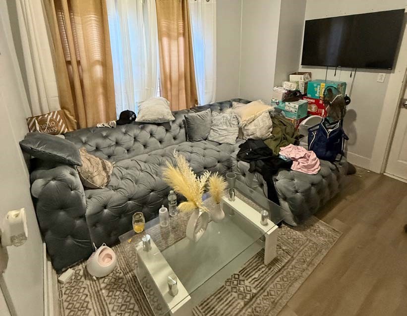 161-167 South Union Street Lawrence, MA 01843 - Photo 11 of 17 a living room with furniture and a flat screen tv