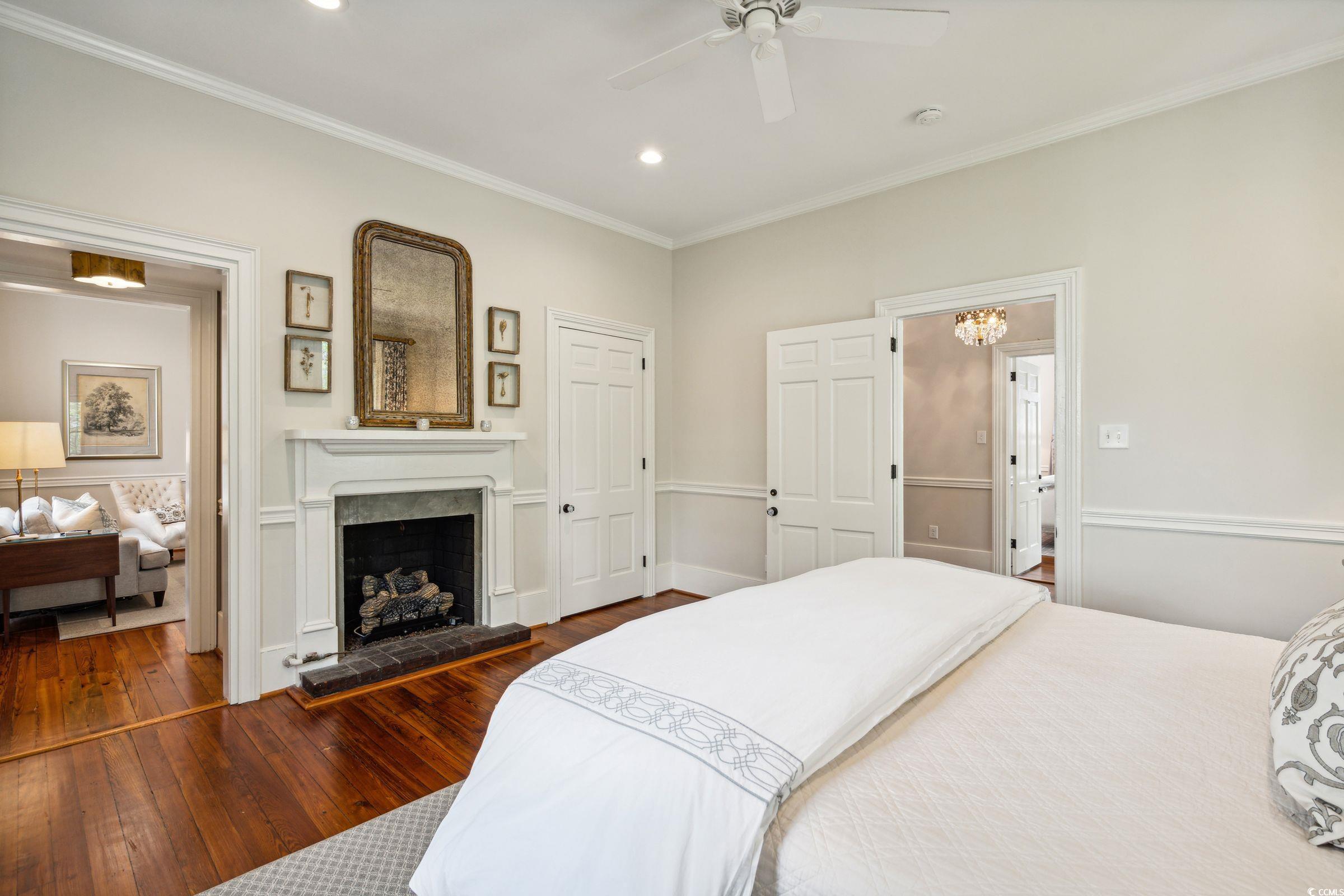 620 Prince Street Georgetown, SC 29440 - Photo 30 of 40 Bedroom featuring ceiling fan, dark wood-type floo