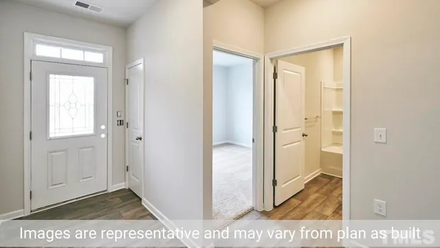 a view of a bathroom with a glass door