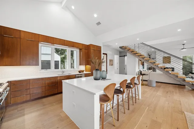 a kitchen with furniture and a table